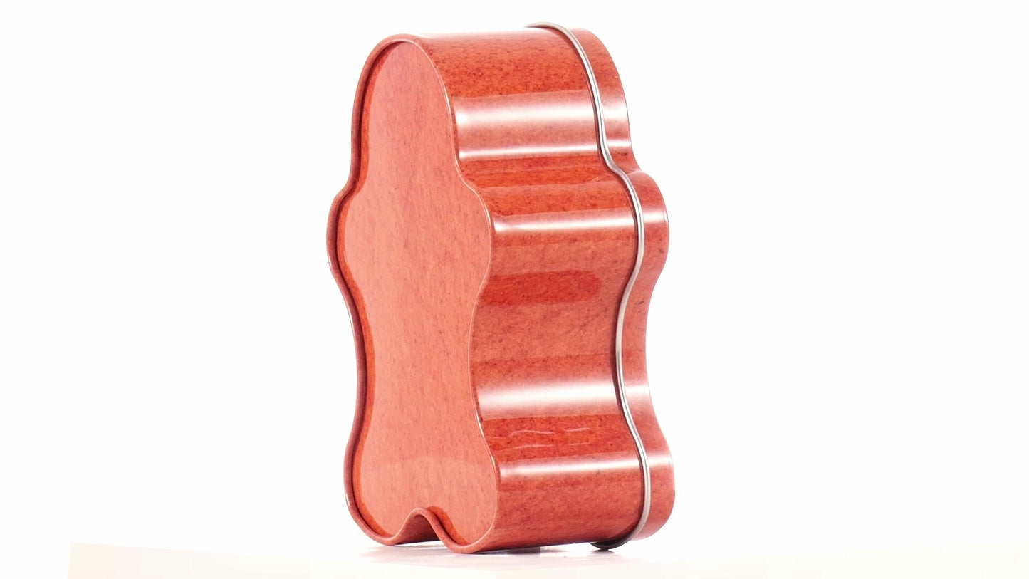 Metal box in the shape of a gingerbread man