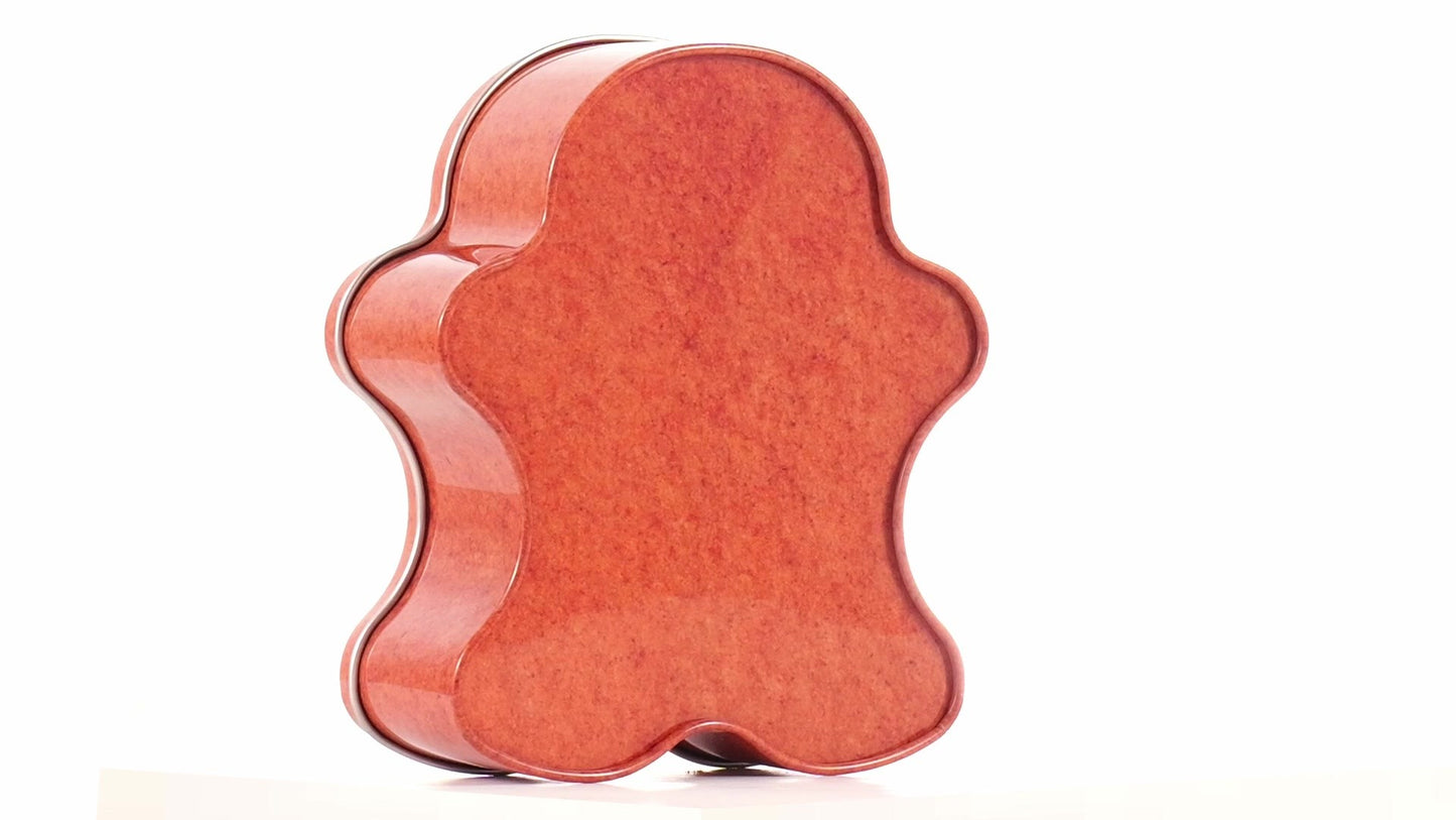 Metal box in the shape of a gingerbread man