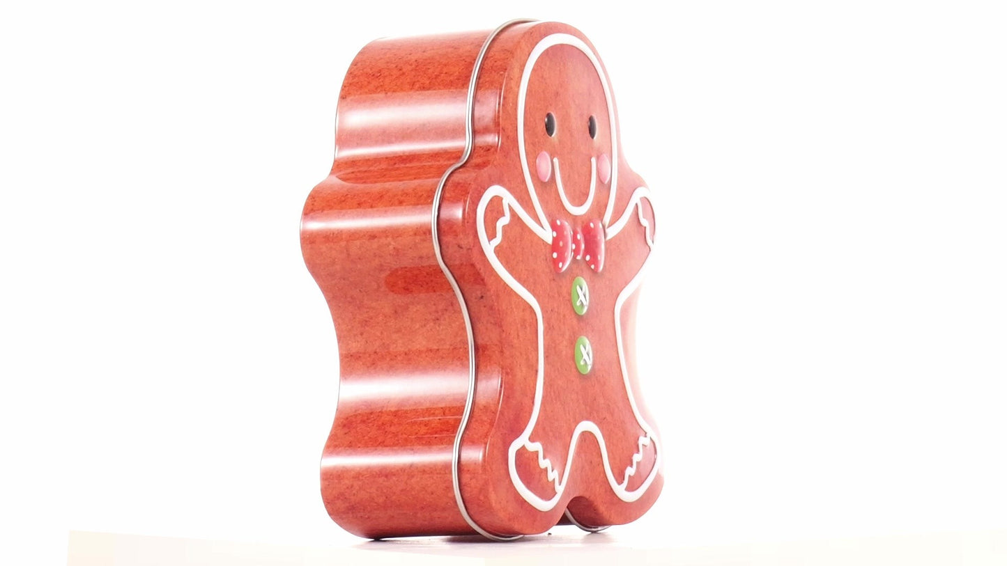Metal box in the shape of a gingerbread man