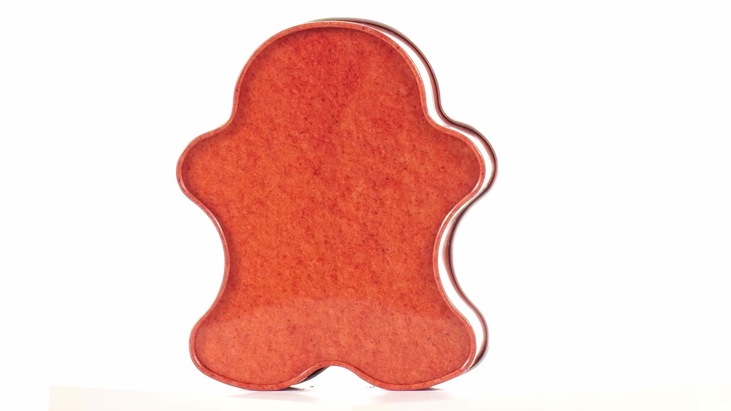 Metal box in the shape of a gingerbread man