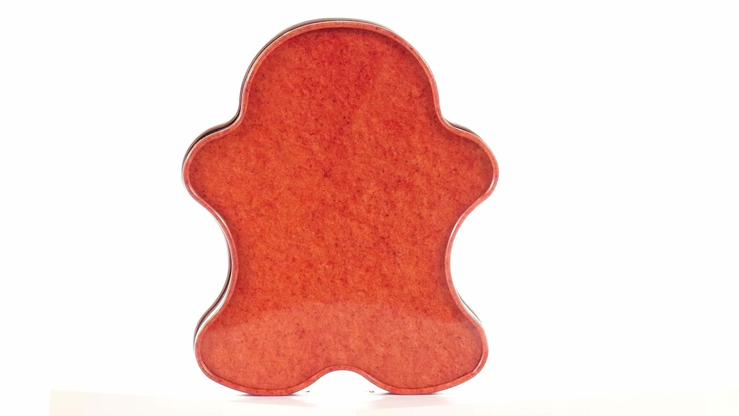 Metal box in the shape of a gingerbread man