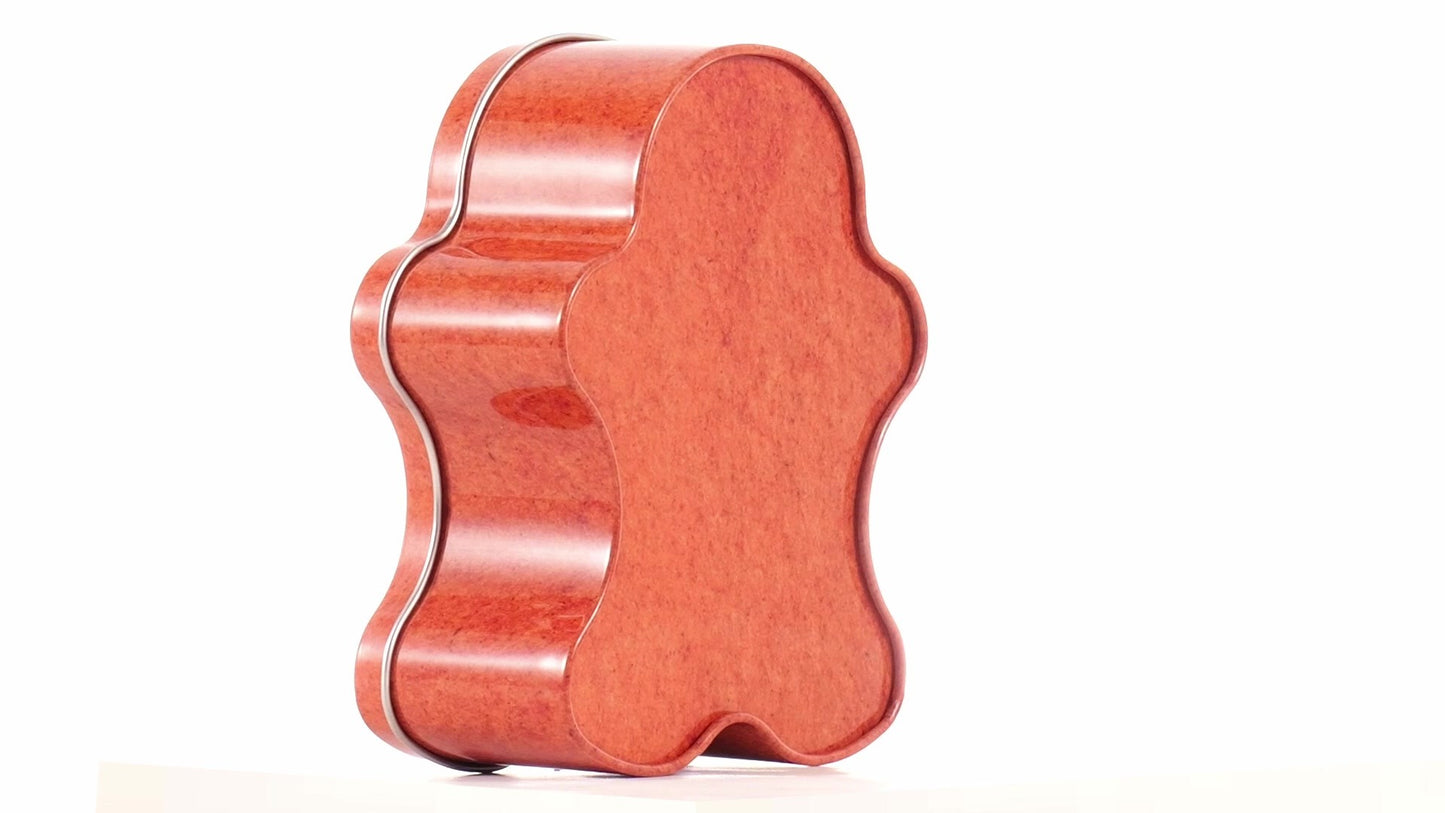 Metal box in the shape of a gingerbread man