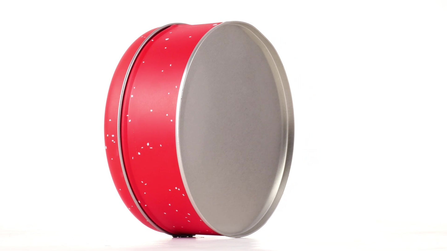 Red round metal box with Santa Claus pattern