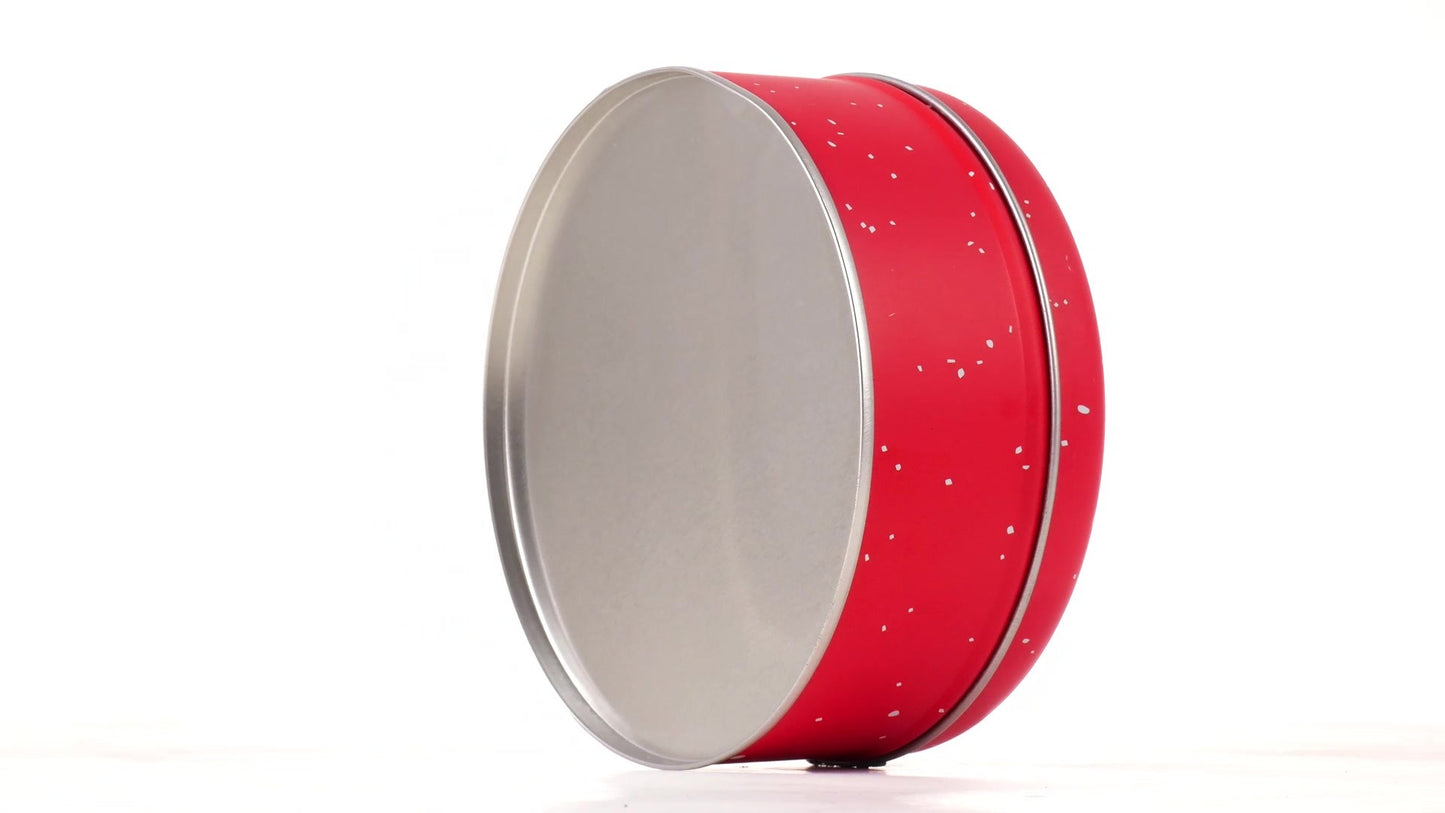 Red round metal box with Santa Claus pattern