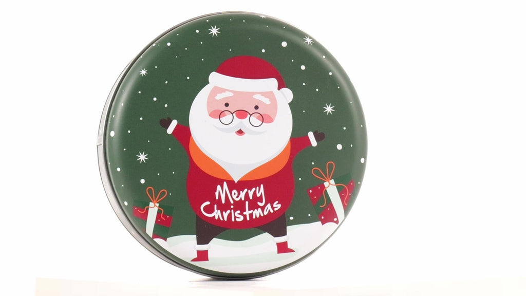 Round green metal tin with Santa Claus design