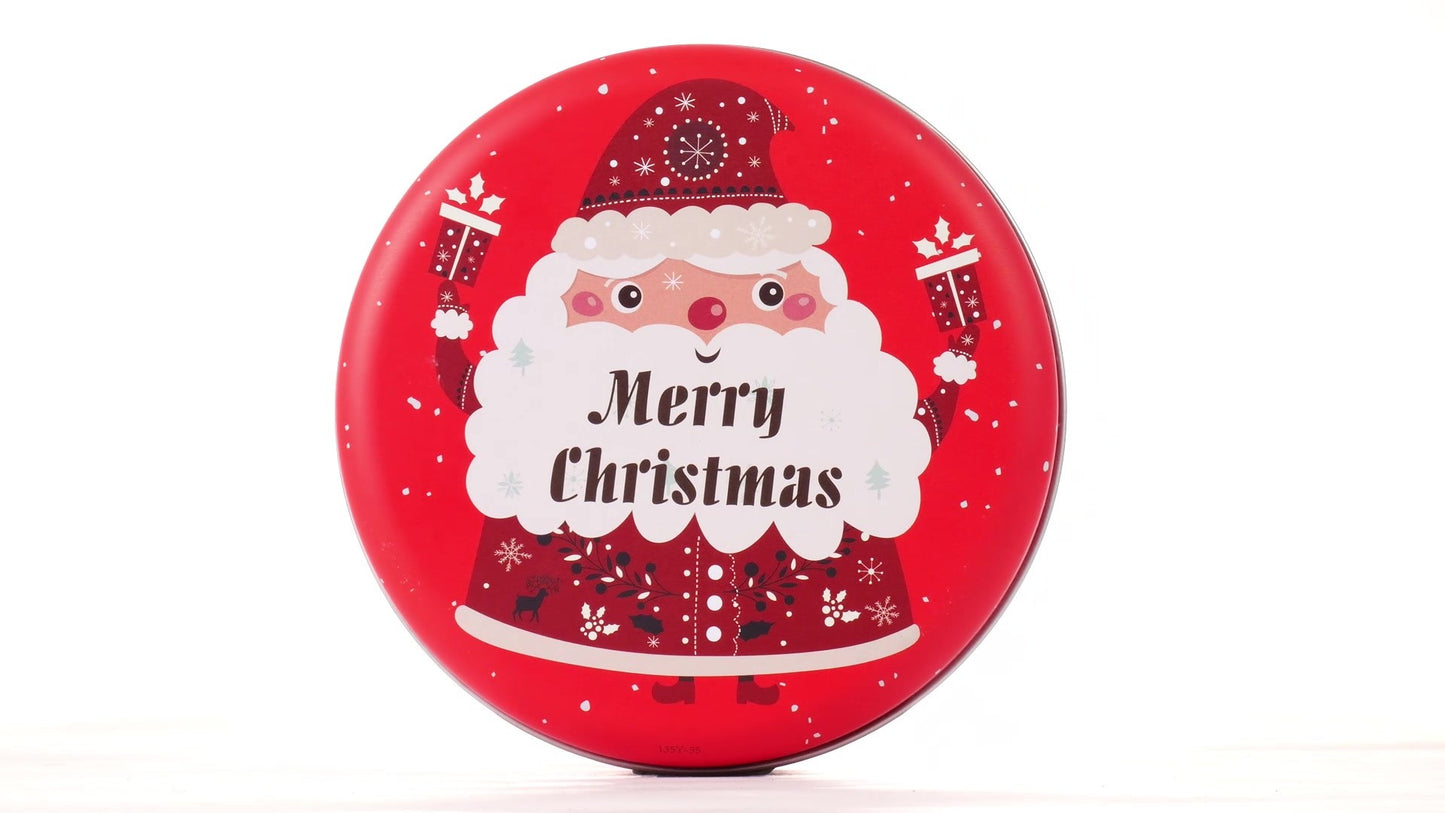 Round red metal tin with Santa Claus design