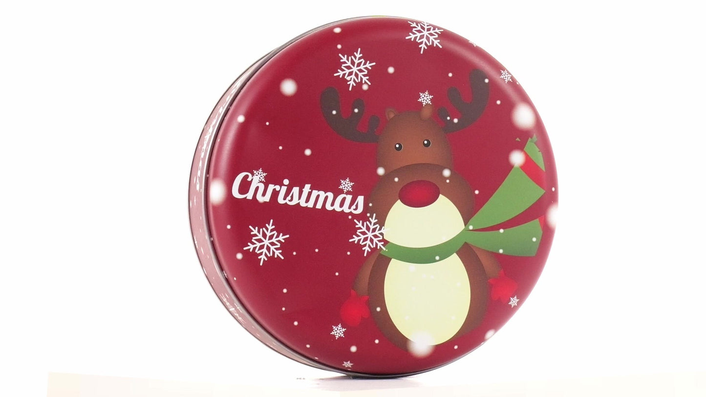 Round red metal tin with Christmas reindeer pattern